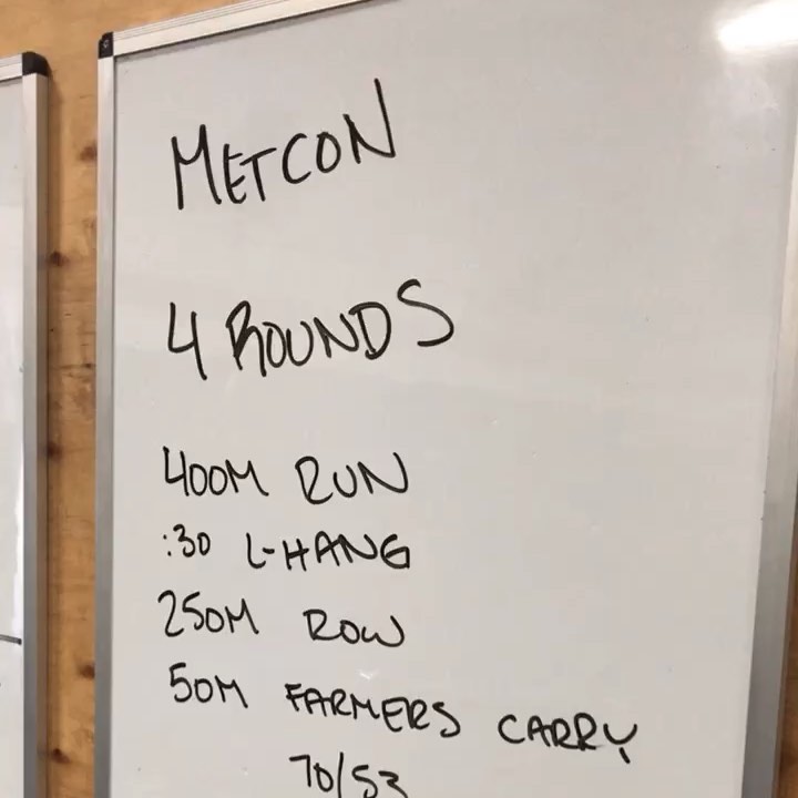 @adaptivecrossfit athlete @dianamaddalon hitting today’s workout as prescribed.. 4 rounds of 400m run, :30 L-hang, 250m row, 50m farmers carry. She used a strap for the farmers carry, and the rings for the L-hang! @crossfit